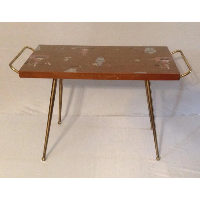 A cool side table by Jese Mobel of Denmark, dating from circa 1950s/60s. Table top features inlaid liquor images....