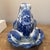 A lucky charm frog. Beautiful garden figure in blue and white. 9” x 8.5” tall