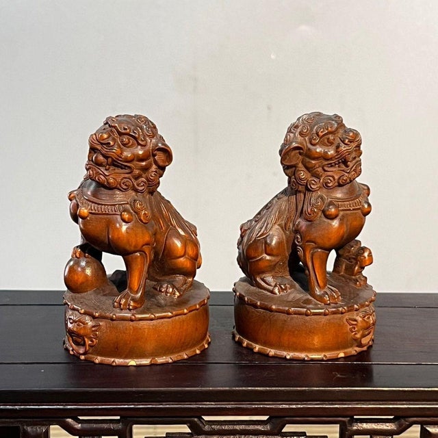 Add a touch of traditional Chinese charm to your desk or shelf with this exquisite pair of hand-carved miniature Guardian...