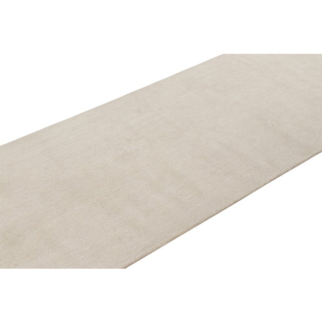 Hand-knotted in a luxurious blend of wool and silk, this extra-long 3x18 runner rug is a new addition to Rug & Kilim’s...