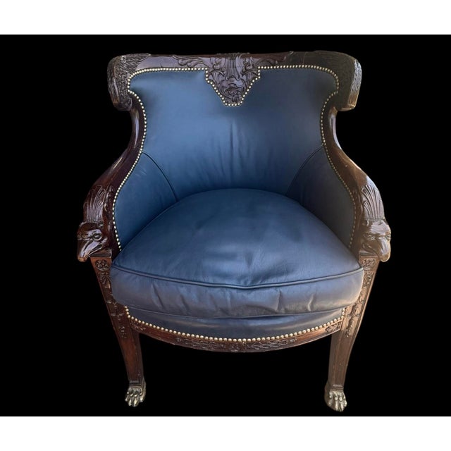 Fine pair of Russian Empire Style Carved Mahogany Bergère Armchairs, probably St. Petersburg, circa 1820-1830. Each with a...