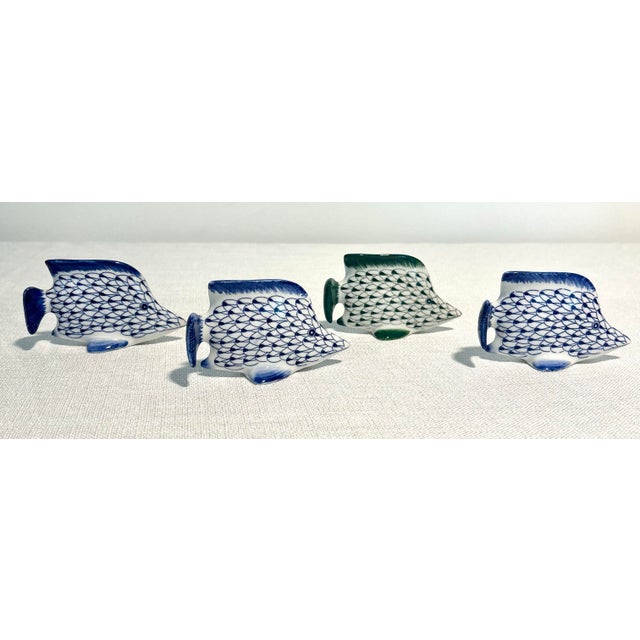 Charming coastal assortment of Andrea by Sadek porcelain fishnet figurines featuring beautifully detailed sea life motifs...