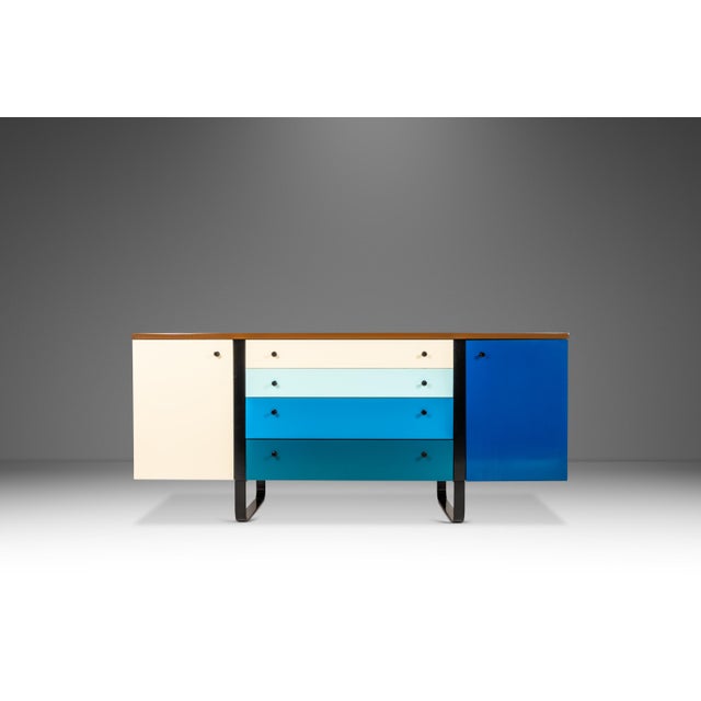 Introducing a restored, custom made mid-century modern credenza closely styled after iconic modular storage units of the...