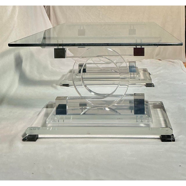 Coco Chanel style 1970's vintage Mid Century Modern sculptural, chunky Lucite and acrylic mirror base with a rectangular...
