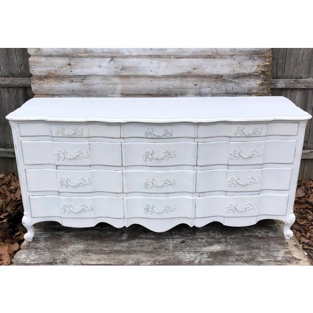 Gorgeous French Provincial dresser by the White Furniture Co., circa 1970. Chalk-painted Linen White, lightly distressed,...