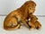 Vintage hand-painted ceramic or porcelain figurine of a male lion with a spotted cub. Possibly dating from the...