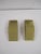 A pair of '70s Modern Art Deco style brass-plated wall sconces with a 'tiered' or 'step' design in the style of designer...