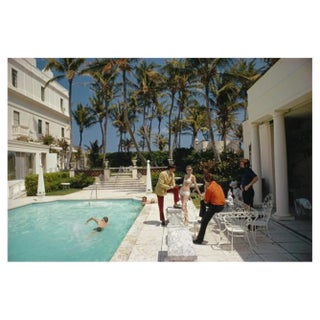 Slim Aarons, Posing by the Pool, Estate Stamped Photographic Print, 1968 / 2020s For Sale