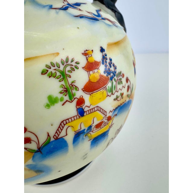 A wonderfully decorative vintage Japanese porcelain vase by Goldcastle Chikusa, dating to approximately the 1940s. The...