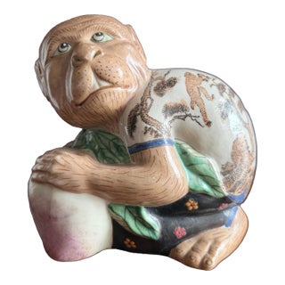 Chinese Vintage Porcelain Monkey Figurine Holding a Pear. For Sale