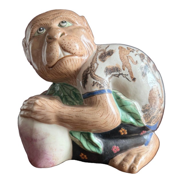 Chinese Vintage Porcelain Monkey Figurine Holding a Pear. For Sale