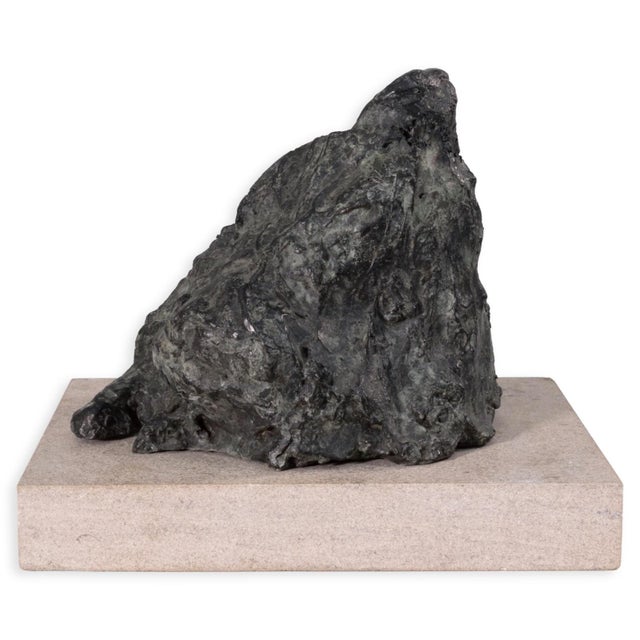 A modern bronze sculpture titled "Spectre (Green)" by American artist Richard Kozlow. Created and exhibited in 1996....