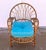 This is a stunning vintage Boho rattan lounge chair. Solid and sturdy, although the front left leg bends a little....