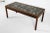 Rosewood coffee table with ceramic tiles inlaid to top. Signed to corner of tiles. Denmark, circa 1970s. Dimensions: H 20"...
