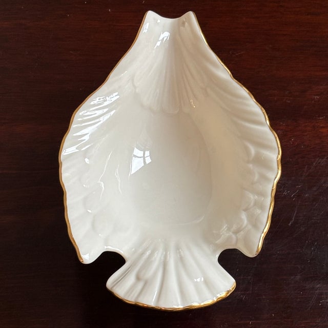 An elegant vintage Lenox porcelain dish in the form of a graceful dove, featuring softly sculpted feather detailing, a...
