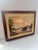 A tranquil harbor scene depicting moored boats at low tide beneath a softly illuminated sky. Muted shades of blue, olive...
