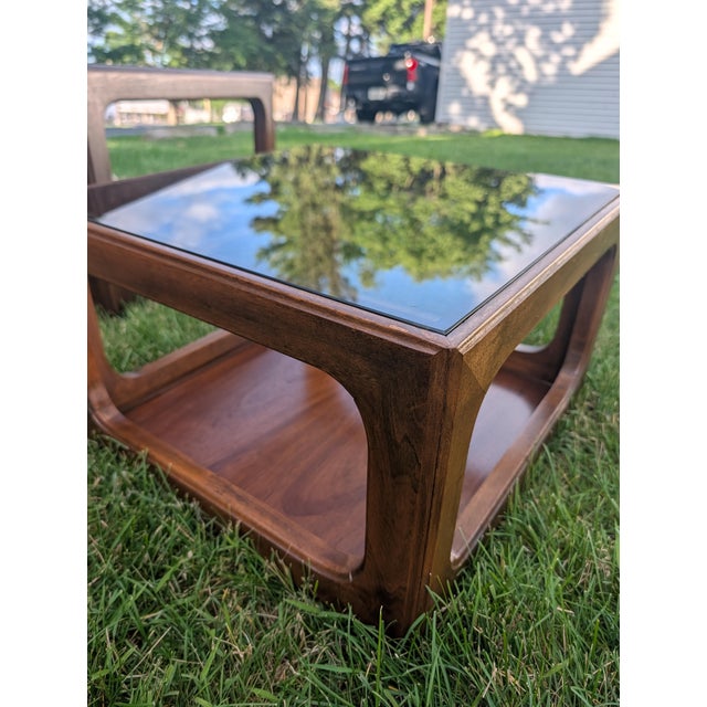 An exceptional four-piece collection of mid-century modern design manufactured by the historic J.B. Van Sciver Furniture...