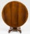 Boldly figured rosewood tilt-top centre table, the circular top with three different widths of crossbanding, the frieze...