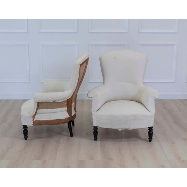 Impressive pair of 19th century French Napoleon III armchairs featuring elegant high backs and beautifully balanced...