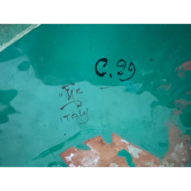 A fabulous antique majolica vase from Italy. The shade of green is one of the prettiest glazes I’ve seen. Scenes of...