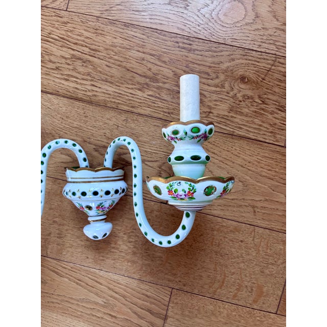 Pair of wall sconces in opaque white glass and translucent green glass. 1950s. In perfect condition. Electrical connection...