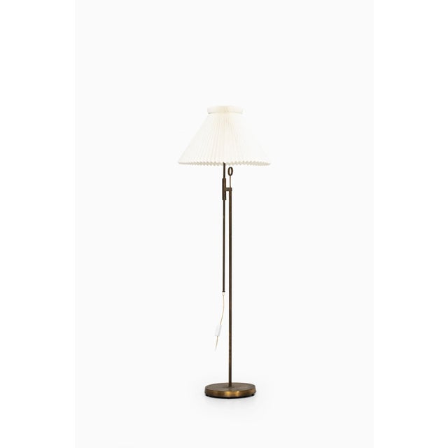 - Height-adjustable floor lamp in brass - Produced by Falkenbergs Belysning in Sweden in the 1950’s - Mid-century...