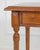 A refined Italian 19th century writing table, crafted in solid walnut and distinguished by its elegant simplicity and...