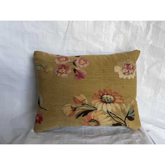 A beautiful circa 1850 French Aubusson tapestry pillow, created from an antique handwoven textile featuring an elegant...