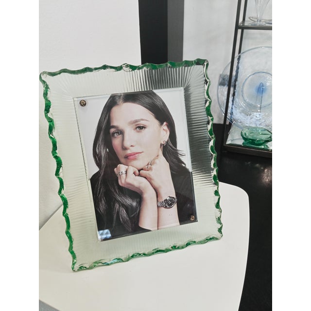 An important portrait frame of large dimensions and refined execution, in very thick crystal glass, chiseled and ground by...