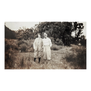 1920s Couple Dressed for Adventure Sepia Snapshot Photograph
