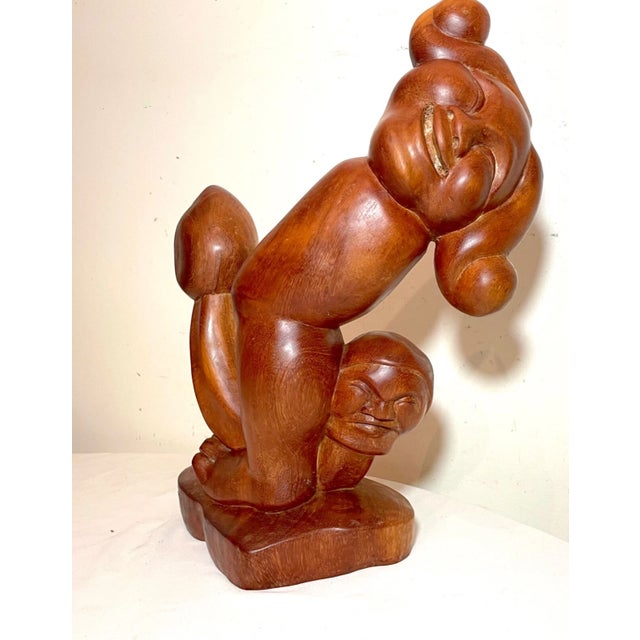 Up for sale is a wonderful vintage hand carved modernist wooden figural sculpture. This gorgeous figure is carved...