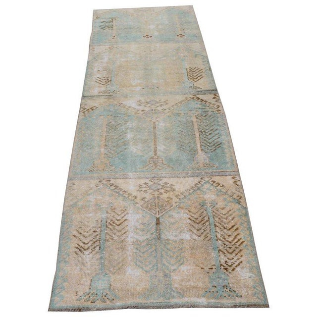 Hand-knotted with care using traditional rug-making techniques, this wool rug blends timeless craftsmanship with a modern...