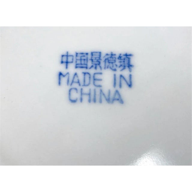 Contemporary Chinese Export-style porcelain plates. Marked underneath. Dimensions: (Largest plate) Dia. 10" Condition:...