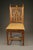A distinctive set of six antique French Gothic-style side chairs dating to circa 1880. Crafted from walnut, these chairs...