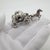 A vintage object depicting a Cinderella-style carriage, handcrafted in Italy between the 1970s and 1980s in authentic...
