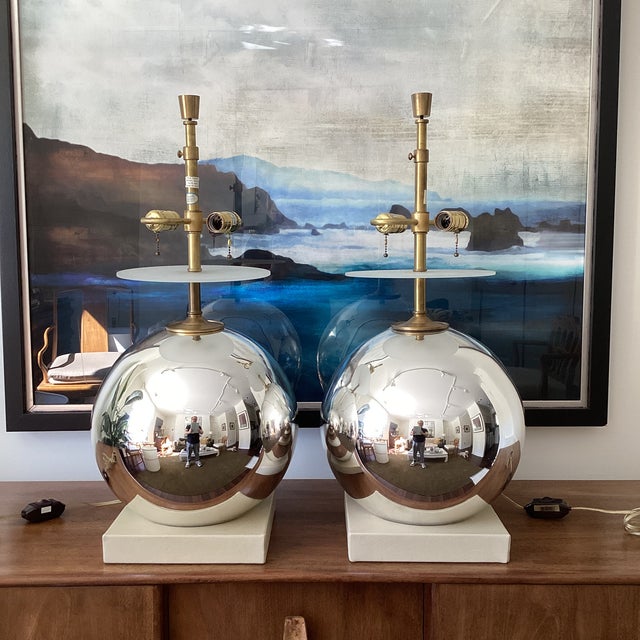 Elegant and sculptural pair of table lamps known to be Bill Sofield for Baker Furniture. They are marked “Made in Italy”...