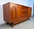 Beautifully crafted Walnut and Burlwood Sliding Door Credenza. This authentic mid-century modern credenza showcases the...