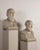 To the right of asclepius and to the left of hippocrates, a monogram composed of an m crossed by a triangle and, below, an...