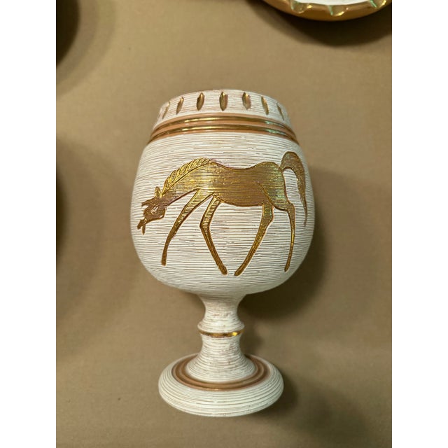 A stunning example of mid-century Italian studio ceramics, this Bitossi chalice-form vase features the iconic graffito...