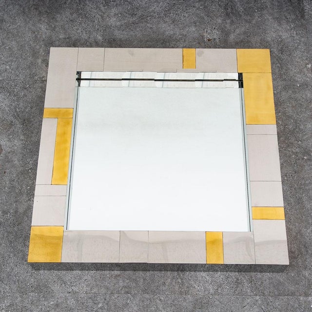 Chrome and Brass Paul Evans Cityscape for Directional wall square mirror. C. 1970. Sits wall mounted on an included French...