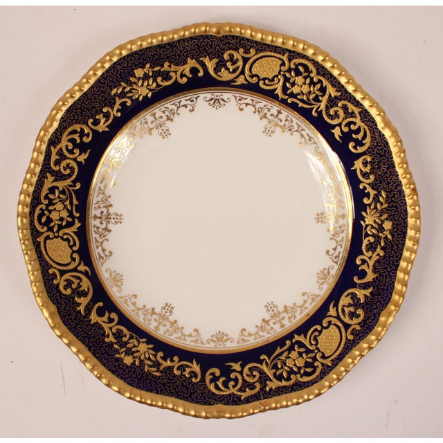 Set of 12 Coalport for Tiffany & Company cobalt blue and gilt decorated 9" plates with raised gilding, circa 1930's.