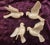Vintage White Porcelain Irredescent Glistening Dove Ornaments Set of 4 Height: 2" W: 3" D: 3.5" In prisintely pre-owned...