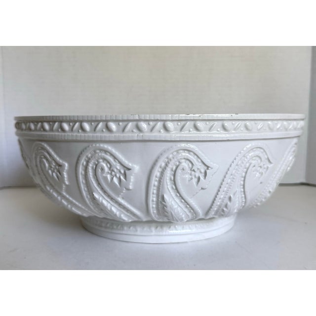 This vintage Mottahedeh ceramic bowl was made in Italy, likely 1960-70s, and features a crisp white glazed finish with...
