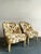 Presenting a stunning pair of vintage lounge chairs, meticulously crafted to embody the sophisticated charm of the...