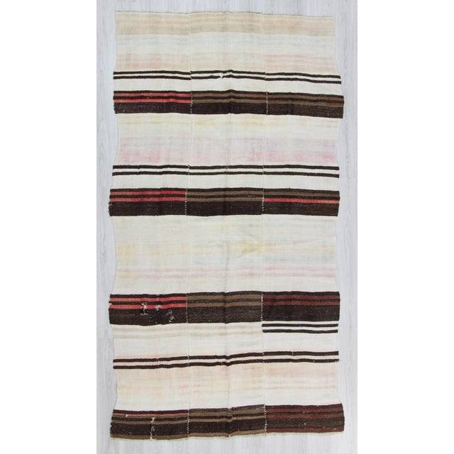 Vintage hemp kilim rug from Yozgat region of Turkey. In good condition. Approximately 50-60 years old.