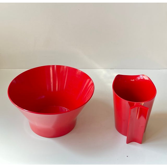 Henning koppel red melamine bowl and pitcher. Manufactured by torben ørskov & co in denmark during the 1970s. It is a...