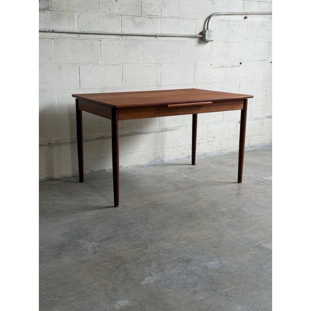 Beautiful vintage Danish Modern writing desk manufactured by Robenstrup Møbelfabrik in Denmark. Crafted in warm teak, this...
