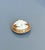 The cameo is carved coral or shell. Encased in a beautiful gold toned frame classical etched pattern, unmarked and unknown...