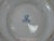 This German KPM porcelain bowl features a floral pattern with grape leaf edges, hand-painted with gold accents. Made in...