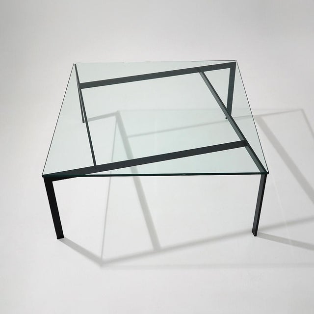 Glass and metal coffee table designed by Paolo Tilche for Arform, Italian production from the 1960s. An essential and...
